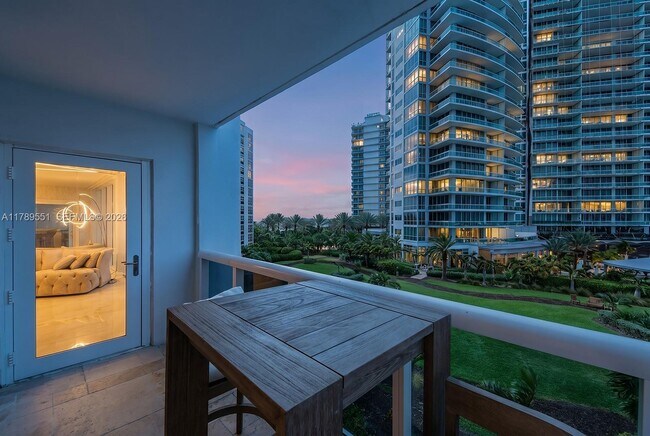 Building Photo - 10275 Collins Ave