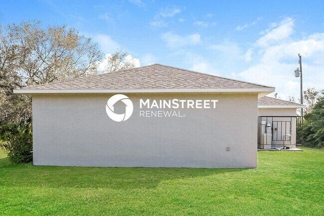 Building Photo - 3 Bedroom Pet-Friendly Home in Lehigh Acres, FL with Main Street Renewal