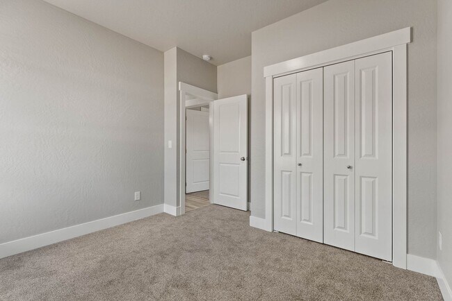 Building Photo - Newly built 4 Bedroom Duplex With Garage