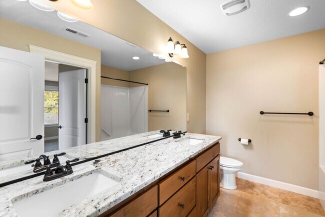 Building Photo - Beautiful Gated Fisher’s Landing Townhome with 4 Bedrooms, Gas Fireplace & Central AC