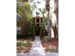 Building Photo - Move in NOW- Spacious 2 bedroom 1 bath condo on 3rd floor in gated community! Water included with...