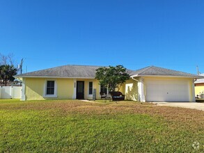 Building Photo - 3 BEDROOM POOL HOME OASIS IN FLORIDA SHORE...