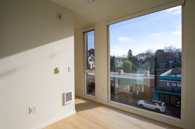 Building Photo - Modern & Bright Corner Urban 1 Bed w DW & W/D!