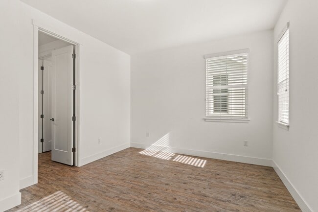 Building Photo - Sun-Filled Corner 4BR w/ Dual Yards & Panoramic Indoor-Outdoor Flow