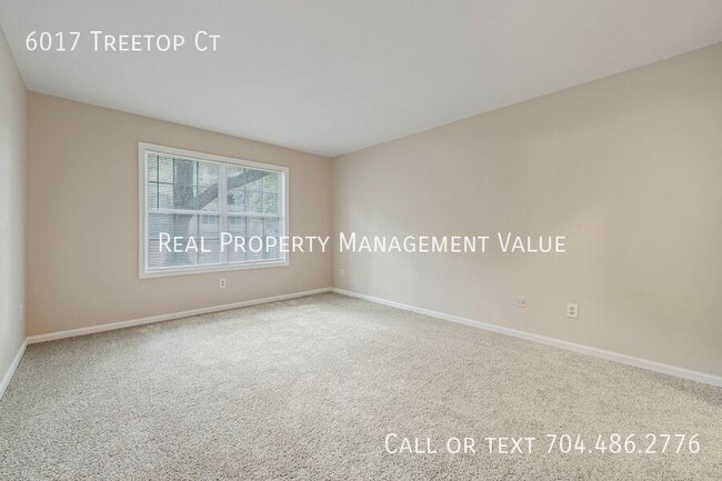 Building Photo - 6017 Treetop Ct