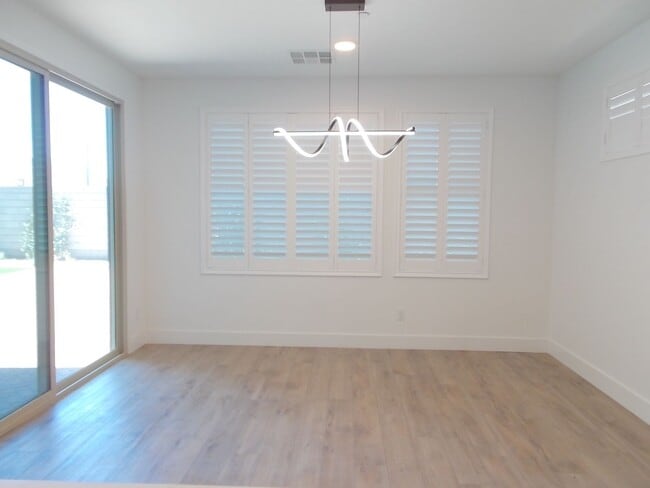 Building Photo - Luxury Brand-New Home with Designer Finishes, Courtyard & Bonus Game Room