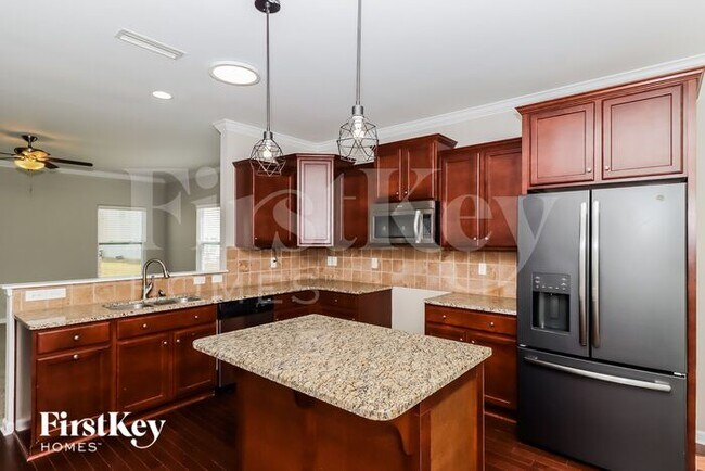 Building Photo - 5695 Saint Adriens Way