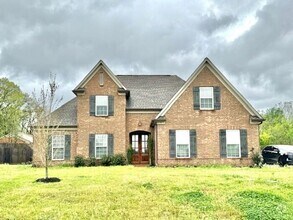 Building Photo - Now Leasing a 4 bedroom 3 bath home in Oli...