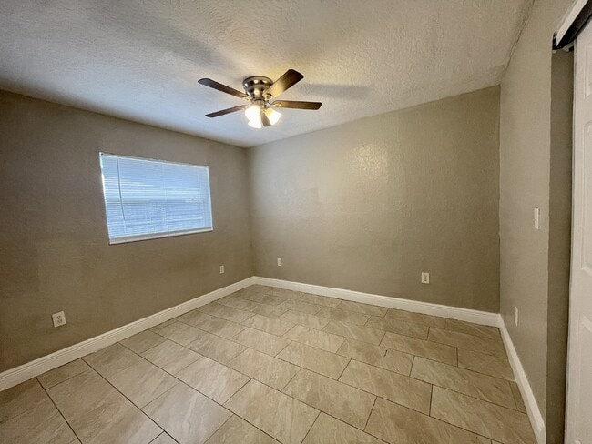 Building Photo - 4 bedroom 2 bathroom pool home for rent