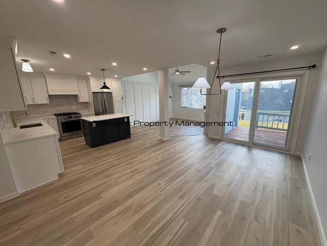 Building Photo - Fully Redesigned Townhouse Style Condo For Rent in Desirable Louisquisset Community!