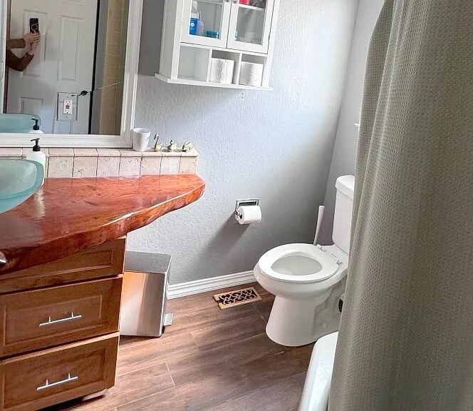 Second bathroom downstairs, upstairs bath has double sink separate from shower room - 3560 Paper Mill Rd