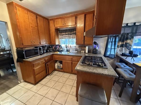 Building Photo - 6311 Heliotrope Ave