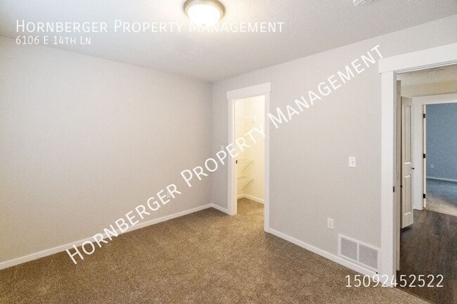 Building Photo - 6106 E 14th Ln