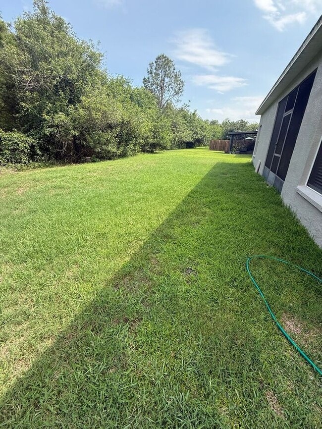 Building Photo - GREAT 3/2 HOME IN WATERSIDE SOUTHEAST ORLANDO