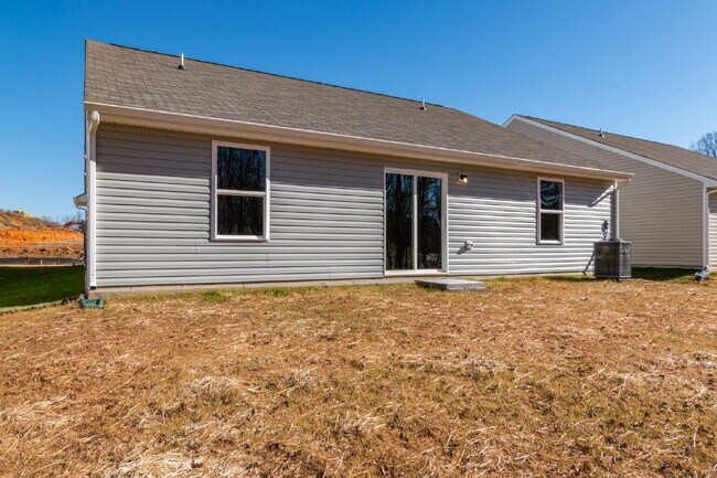 Building Photo - Modern Comfort Meets Outdoor Adventure – Stunning 1-Story Home Near Downtown Greensboro!