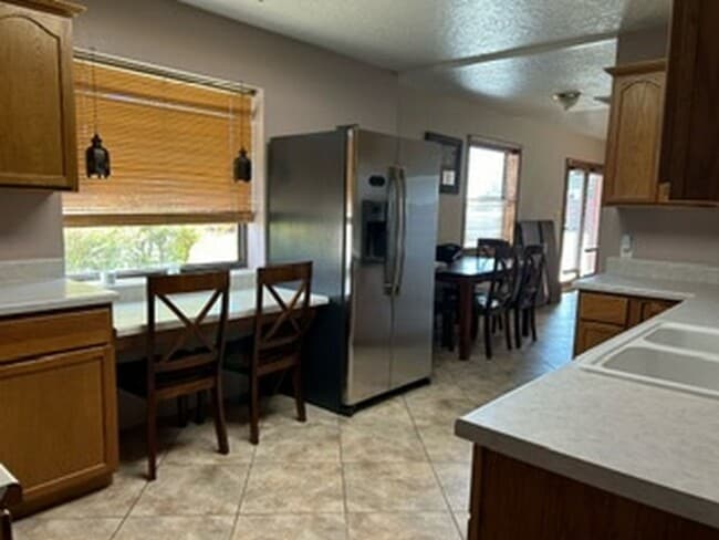 Building Photo - FURNISHED RENTAL, 3 bedroom with 4 car garage