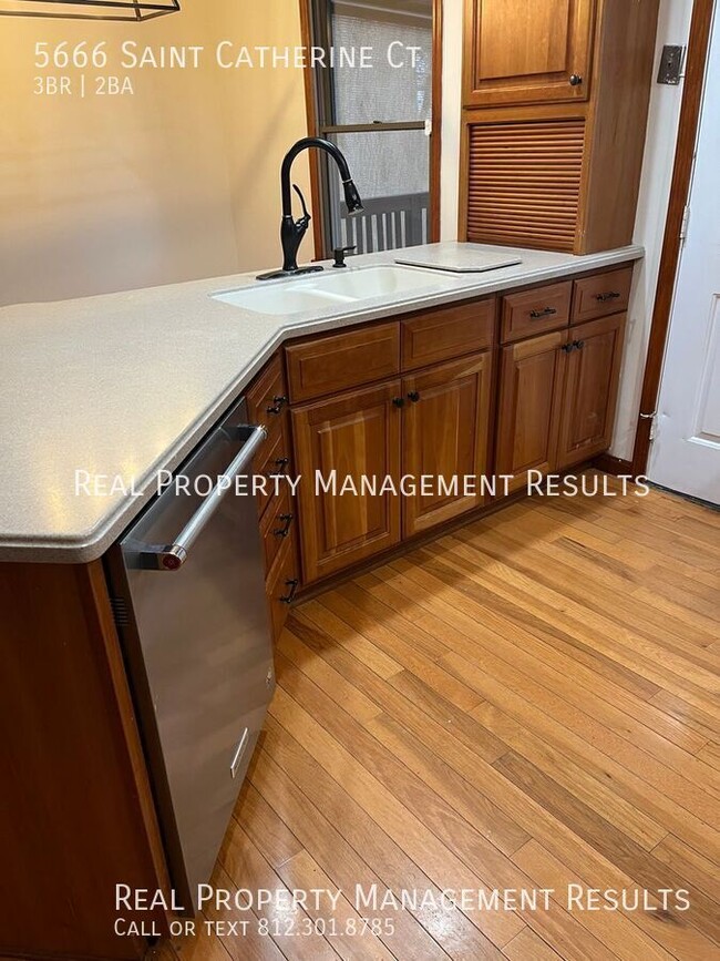 Building Photo - 5666 St Catherine Ct