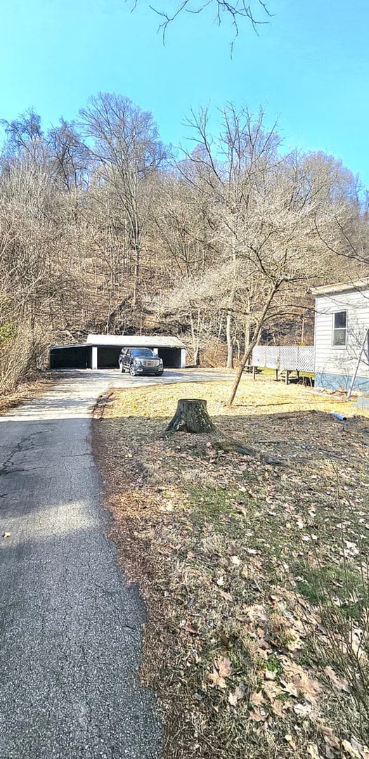 Building Photo - Spacious 4-Bedroom Home with 3-Car Garage, Deck & More!!