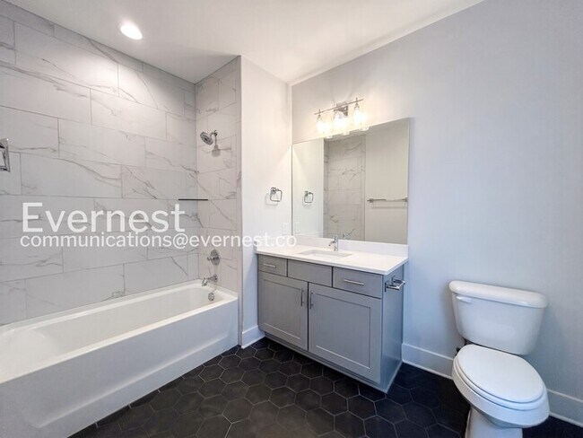 Building Photo - 4 Bed, 4.5 Bath Town Home with Garage / Available Now!