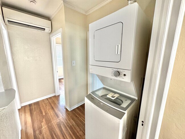 Building Photo - Cute North Park Bungalow! 2bd/1ba, 1 car garage, AC, W/D in-unit, fenced yard!