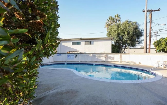 Building Photo - TWO PARKING SPACES INCLUDED! In Unit Washer & Dryer! Large Private Patio for Bikes, Boards and Bb...