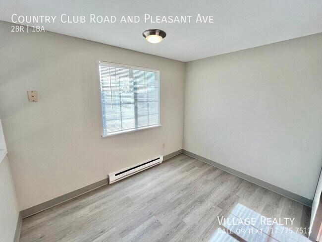 Building Photo - 605 Country Club Rd