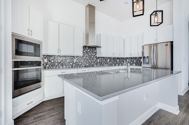 Building Photo - Luxurious Solar Powered 4 Bedroom, 3 Bath Waterfront Home with office & Upgrades Galore!