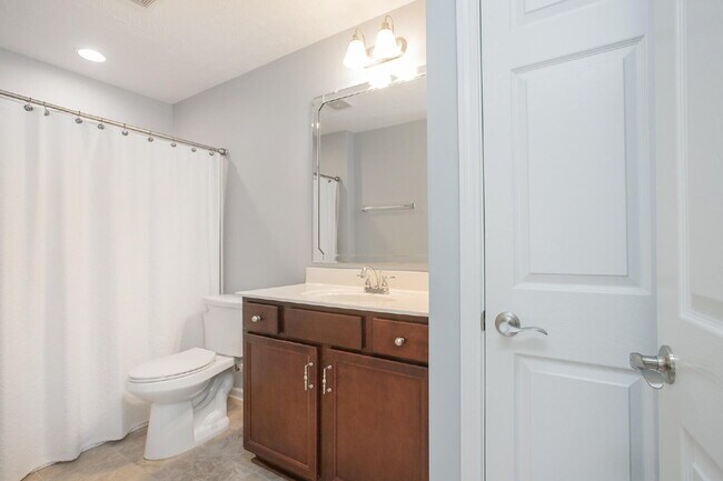 Building Photo - Single-level 2-bed, 2-bath townhome in 55+ community with pool, clubhouse, fitness center and gro...