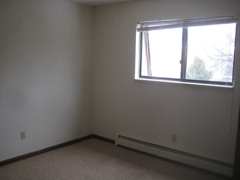 Building Photo - 8990 W 63rd Ave