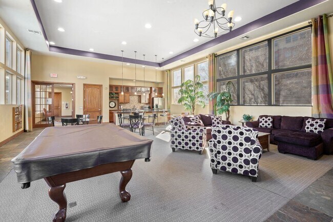 Building Photo - Charming 2 Bed, 2 Bath Top-Floor Condo with Great Sunrise Views