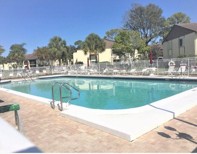 Building Photo - 5930 Whispering Pine Way