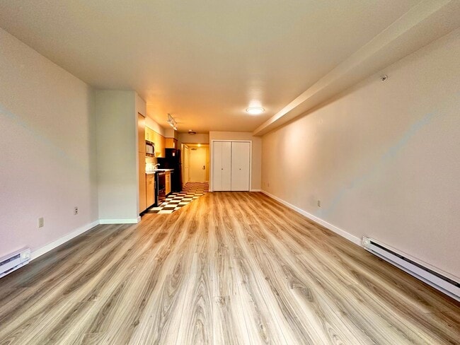 Building Photo - Downtown Bellevue Studio with Balcony, In-Unit Laundry & Amenities