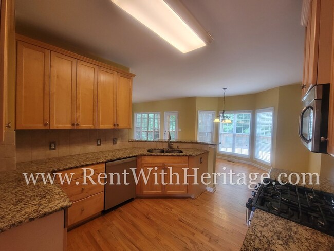 Building Photo - Gorgeous 3-Story Brick Home / 2 Fireplaces / Full Finished Basement / Chapel Hill Schools