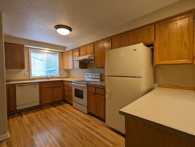 Building Photo - Beautiful 2-Bedroom, 1.5-Bath Condo. Landscaping included!