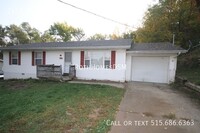 Building Photo - Large 3 bedroom 2 bath home with attached ...