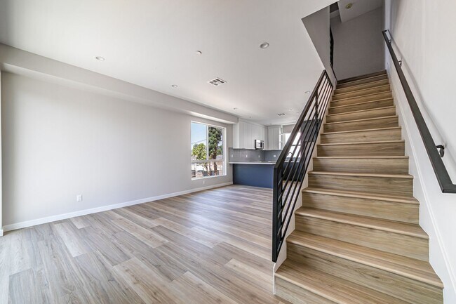 Building Photo - Contemporary 4-Bed, 4.5-Bath Townhome with...