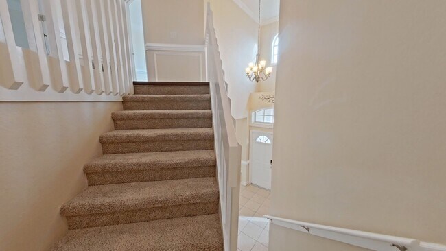 Building Photo - Spacious 6-Bedroom Pool Home with Open Floor Plan & Private Master Suite