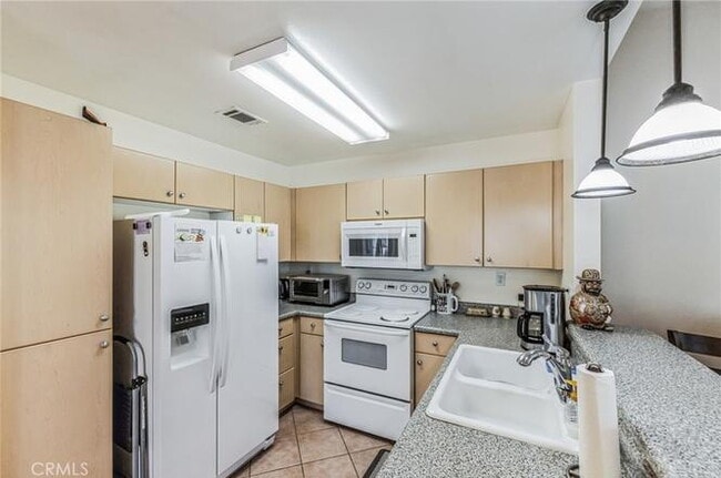 Building Photo - 55+ Age restricted community - This spacious 2-bedroom, 2-bathroom Home is located in the desirab...