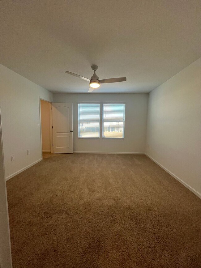 Building Photo - Town Home in The Trails -2 Primary Suites!!