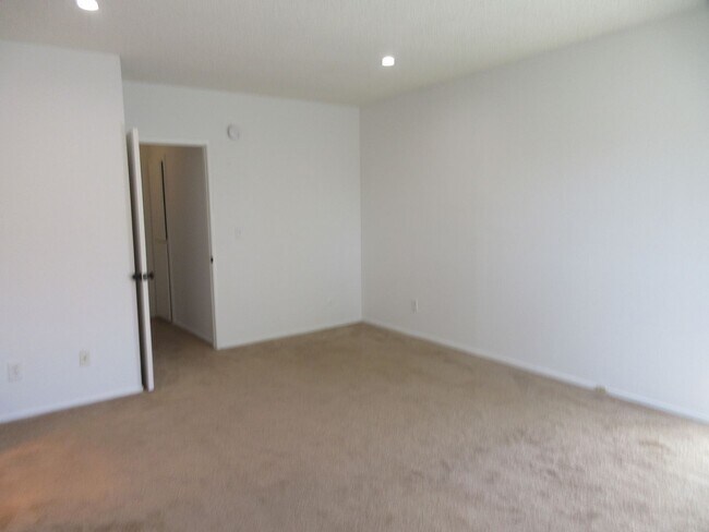 Building Photo - Duggan Property Management, Inc presents  *Reduced*  Canoga Park- 3BD 2.5BA