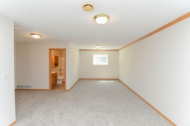 Building Photo - Updated 3BR Split-Level Home with Huge Deck, Fenced Yard & 2-Car Garage Near I-29!
