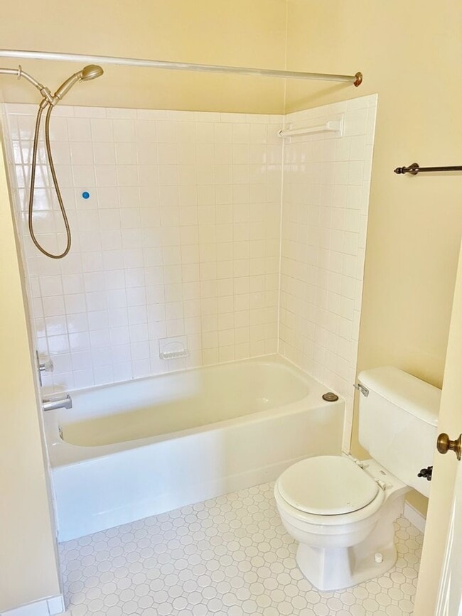 Building Photo - Updated, all brick 3 level townhouse pet friendly townhouse for rent!