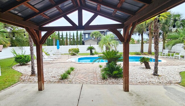 Building Photo - “Elegant 5-Bed Executive Home with Pool – ...