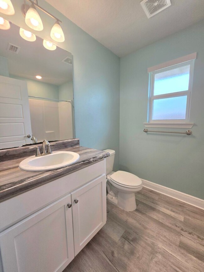 Building Photo - Bright, Open Layout | Screened Porch + Paver Patio | Move-In Ready