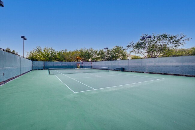 Building Photo - FULLY FURNISHED! Exudes sophistication with designer touches throughout