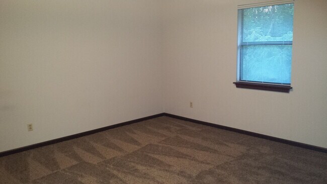 Building Photo - 2 bd,1 ba top level Smithton condo, w/d, deck overlooking trees by Broadway and Hwy 63