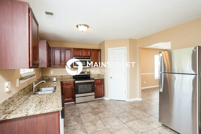 Building Photo - 5 Bedroom Pet-Friendly Home in Fairburn, GA with Main Street Renewal