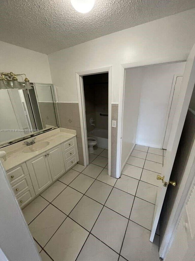 Building Photo - 6095 W 19th Ave