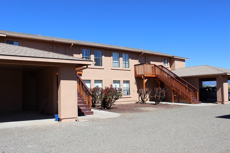 Front View of four-plex apartment building. This unit is on top side (closest to carport) area in pic. - 4430 North Duke Drive