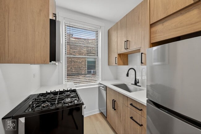 Building Photo - 6971 N Bell Ave